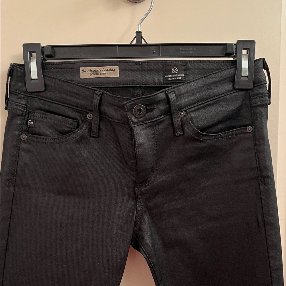 AG Adriano Goldschmied. Black coated low rise skinny jeans. Size 25